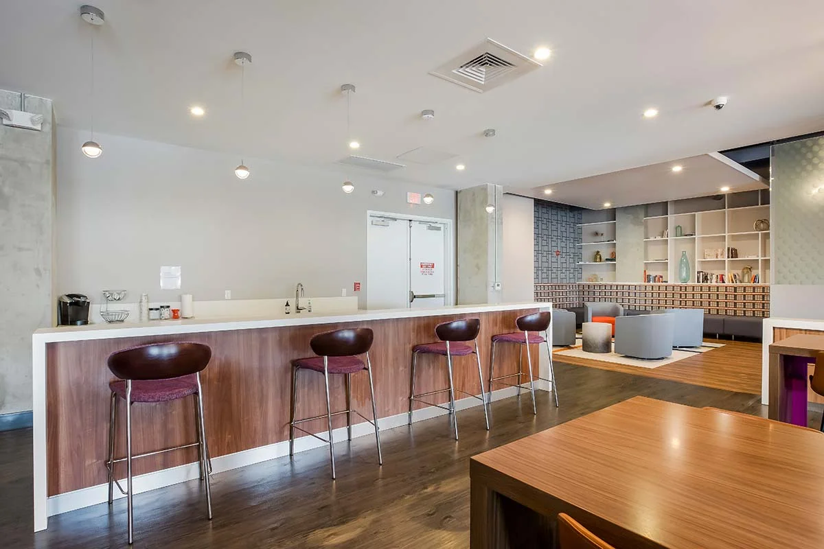 The resident lounge kitchen counter with bar stools