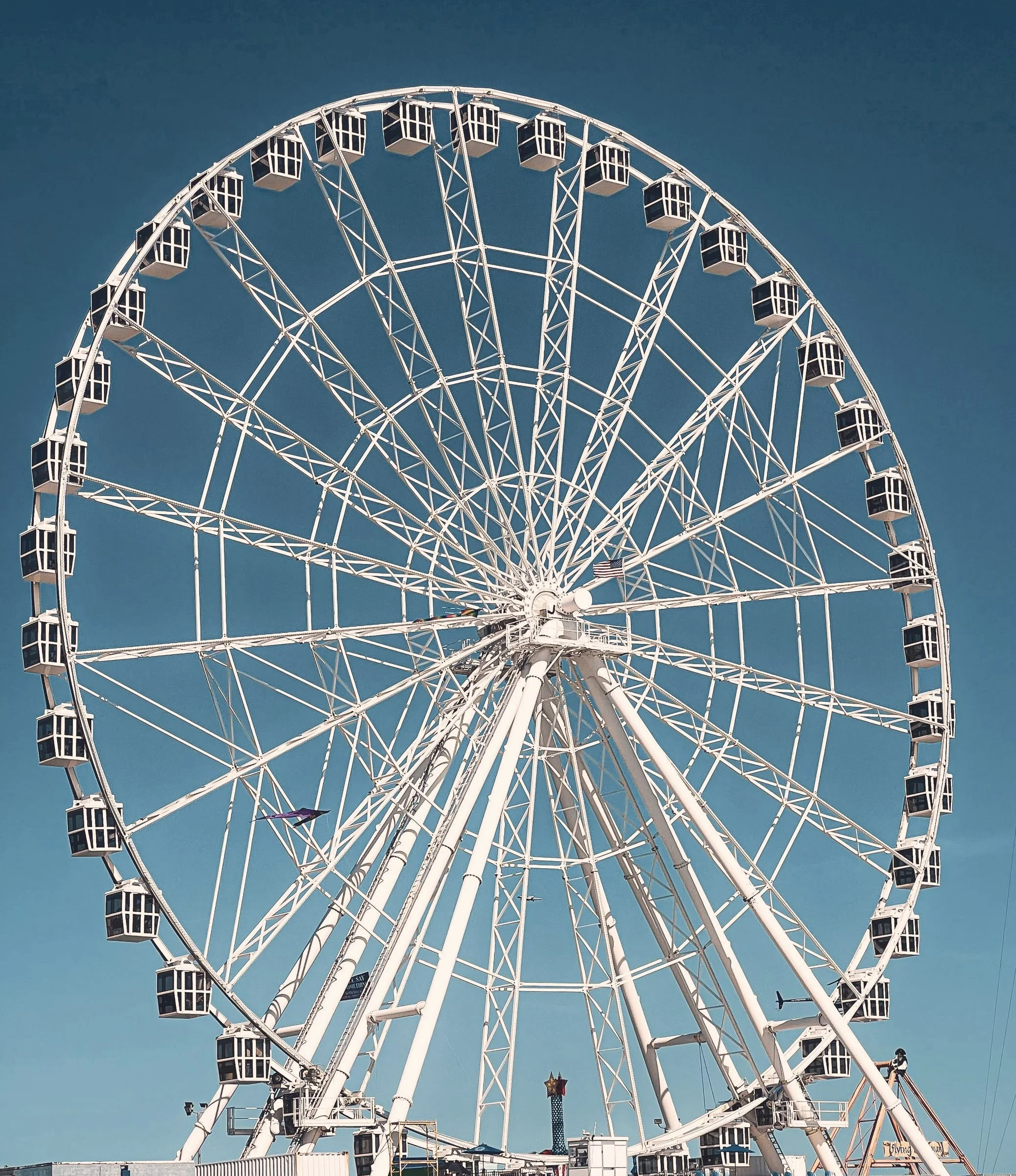 The Steel Pier Ferris wheel against a deep blue sky
